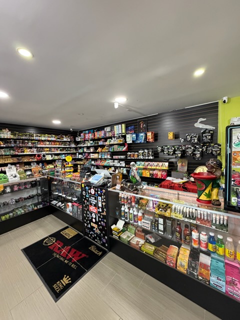 Counter and drinks selection at Pirate's Bay Smoke Shop